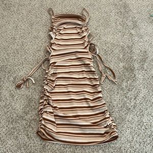 This dress is different shades of browns. Never worn it. Didn’t fit me right